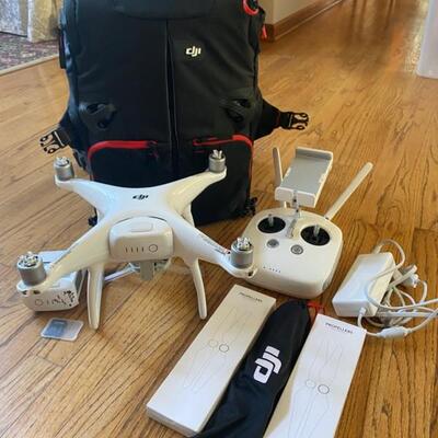 Phantom 4 Drone W/Controller, 2x Batteries, Charger, Propellers & DJI Backpack