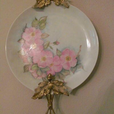 BRASS PLATE HOLDERS AND PAINTED PLATES