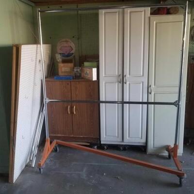 #1060 • Clothes Rack, Cabinets, Survival Kit And More

