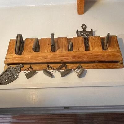 Antique wooden sad iron holder