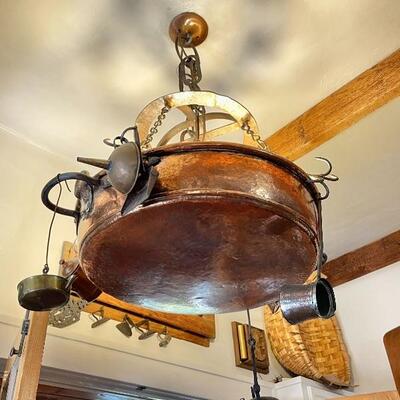 Very unique copper ceiling light with butcherâ€™s meat hanging hooks