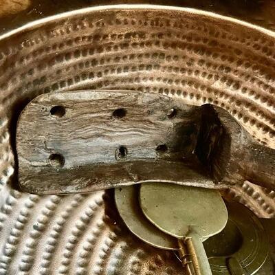 Primitive wooden scoop used with a wine press