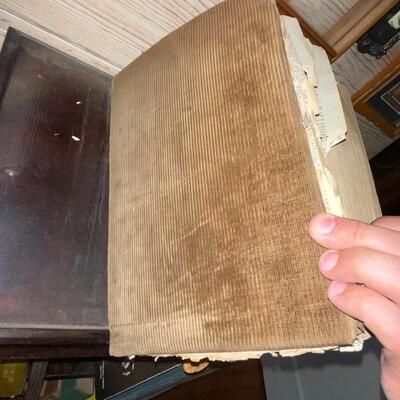 Large antique dictionary with corduroy cover