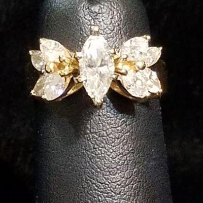 1.34  Carats of Diamonds in 14k Gold featuring a 1/2 Carat Marquise (SI2 G) Center Diamond