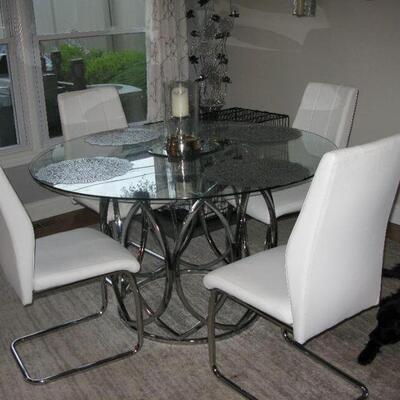 glass top and chrome table with 4 chairs                                   
          BUY IT NOW $ 300.00