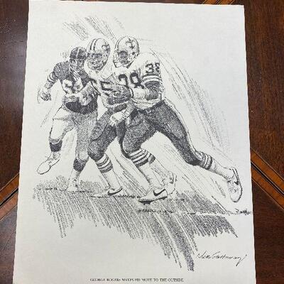 https://www.ebay.com/itm/124776491543	TM9448 New Orleans Saints Print 1981 George Rogrs Makes his move to the Outside 
