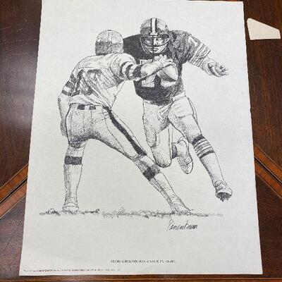 https://www.ebay.com/itm/124776492335	TM9447 New Orleans Saints Print 1981 Eloi Grooms has a Sack in Sight 13.75" X 
