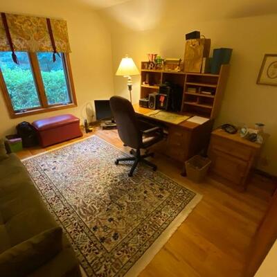 Computer desk, office chair, area carpet and Hourglass storage ottoman