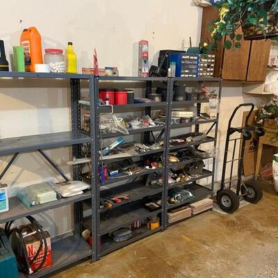 Storage shelved with tools and miss nails, bolts, washers etc