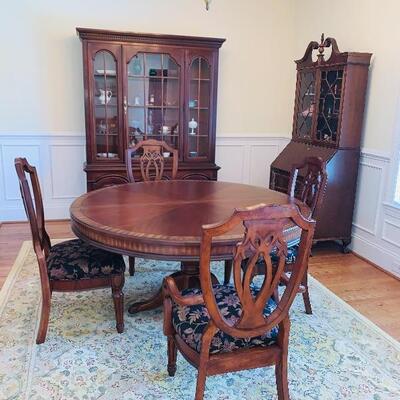 China cabinet $400
Secretary $450
Dining room table and chairs $850