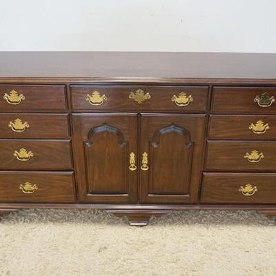 1136	NINE DRAWER, TWO DOOR CHEST WITH INTERIOR DRAWERS BEHIND THE DOORS. 68 IN WIDE X 34 IN HIGH
