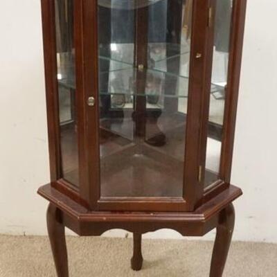 1154	SMALL MIRROR BACK CORNER CURIO CABINET ON CABRIOL LEGS. WEAR TO TOP FINISH. 21 1/4 IN X 39 1/2 IN HIGH
