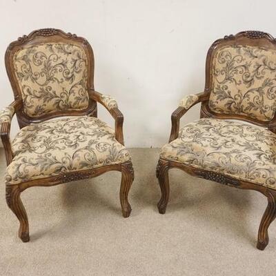 1179	PAIR OF UPHOLSTERED CARVED CENTURY ARM CHAIRS
