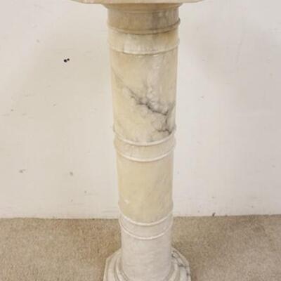 1085	MARBLE PEDESTAL, 10 1/2 IN SQUARE X 39 1/2 IN HIGH
