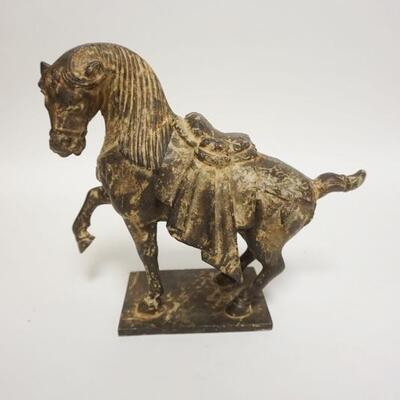 1119	CAST IRON ASIAN HORSE FIGURE, 8 1/2 IN LONG X 8 IN HIGH
