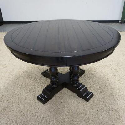 1023	ROUND COUNTRY TABLE W/ONE TABLE LEAF, 4 FT X 30 1/4 IN, TABLE LEAF IS 24 IN WIDE

