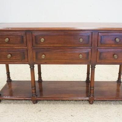 1129	SIX DRAWER SIDEBOARD WITH A SHELF BENEATH. 65 IN WIDE X 36 IN HIGH X 18 IN DEEP
