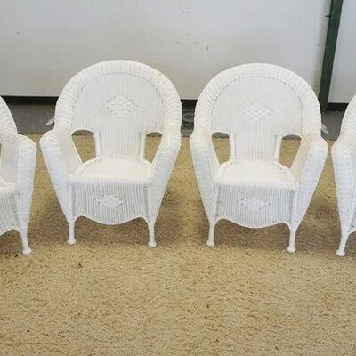 1167	VINYL WOVEN PATIO SET WITH GLASS TOP TABLE AND 4 ARM CHAIRS. 47 IN X 28 IN
