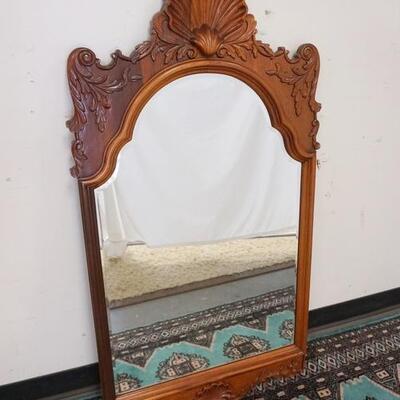 1134	CARVED BEVELED MIRROR WITH SHELL CREST. 24 IN X 48 IN.
