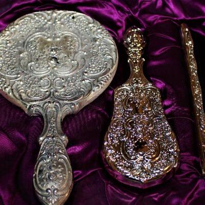 Ornate, silver plated vanity set.