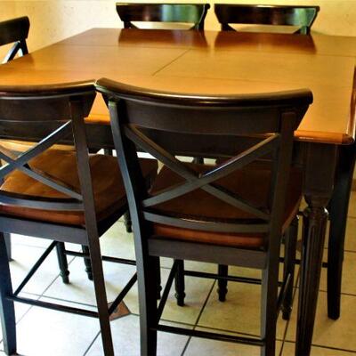 Ultra cool, contemporary dining set with six chairs.  With leaves table measures 54" x 54".