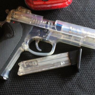 Smith and Wesson clear Airsoft pistol.