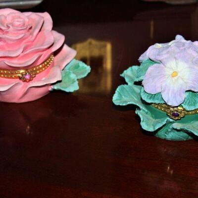 Ornate porcelain jewelry boxes.