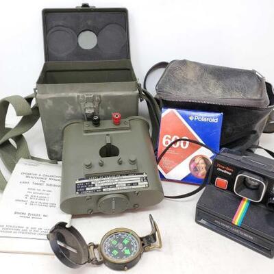 #8304 â€¢ A Light. Target Surveying, A Compass And A Polaroid Camera
