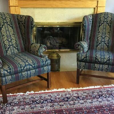 Woodmark Wingback Chairs in Damask and Stripe Upholstery. Chairs measure 43in tall x 29in wide. Seat Depth is 22in.