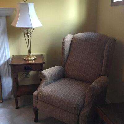 Reclining Wing Chair, Mission Style End Table, Lamp.