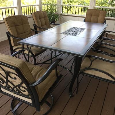 $600 - PATIO DINING SET INCLUDING TABLE AND 6 ARM CHAIRS WITH CUSHION