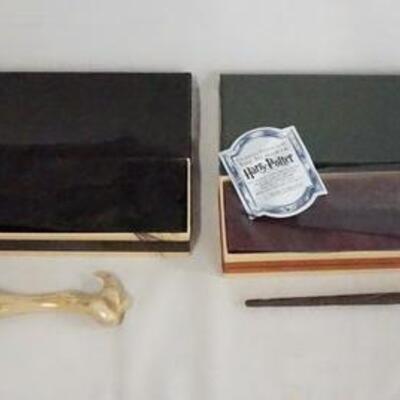 1039	LOT OF TWO HARRY POTTER THE NOBLE COLLECTION WAND REPLICAS, LOT INCLUDES LORD VOLDEMORT & SIRIUS BLACK REPLICAS W/  ORIGINAL BOXES. 

