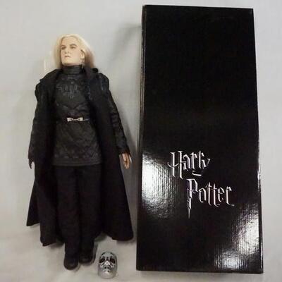 1120	HARRY POTTER TONNER DOLL LUCIUS MALFOY DEATH EATER, COMES W/ STAND, BASE, DEATH EATER MASK & ORIGINAL BOX. 19 IN H 
