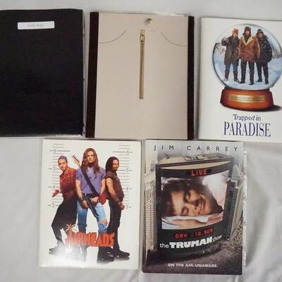 1025	LOT OF FIVE MOVIE PRESS KITS. LOT INCLUDES; THERE'S SOMETHING ABOUT MARY, TRAPPED IN PARADISE, THE TRUMAN SHOW, AIRHEADS, & LITTLE...
