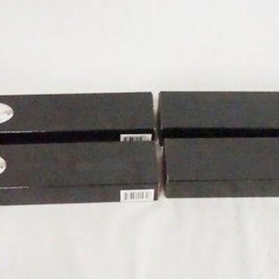 1055	LOT OF FOUR HARRY POTTER THE NOBLE COLLECTION WAND REPLICAS. LOT INCLUDES, PIUS THICKNESSE, RUFUS SCRIMGEOUR, PROFESSOR SYBIL...