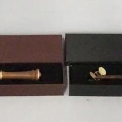 1126	LOT OF TWO THE NOBLE COLLECTION HARRY POTTER WAND REPLICAS, LOT INCLUDES KINGSLEY SHACKLEBOLT & MUNDUNGUS FLETCHER W/ ORIGINAL BOXES. 
