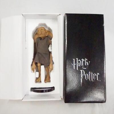 1061	HARRY POTTER 10 IN KREACHER TONNER DOLL COMES W/ STAND & ORIGINAL BOX 

