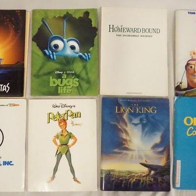 1037	LOT OF EIGHT DISNEY MOVIE PRESS KITS. LOT INCLUDES, TOY STORY 2, MONSTERS INC., PETER PAN, A BUGS LIFE, HOMEWARD BOUND, OLIVER &...
