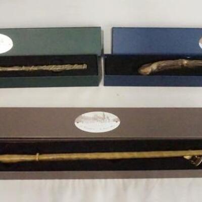1127	LOT OF THREE THE NOBLE COLLECTION HARRY POTTER WAND REPLICAS, LOT INCLUDES HERMOINE GRANGER, THE SNATCHER WAND & LUCIUS MALFOR W/...