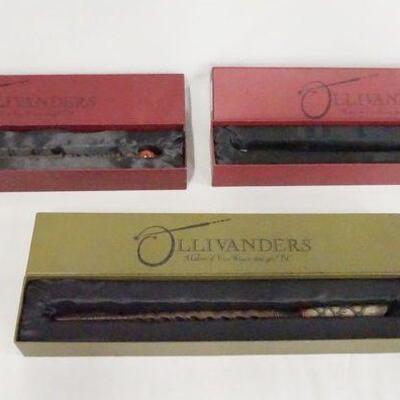 1067	LOT OF THREE WIZARDING WORLD OF HARRY POTTER *OLLIVANDERS* WANDS LOT INCLUDES HOLLY, IVY, & ASH. IN ORIGINAL BOXES
