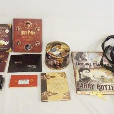 1179	LOT OF MISC. HARRY POTTER COLLECTABLES INCLUDING A FILM WIZARDY BOOK W/ EXTRAS INSIDE, THE UNOFFICAL HARRY POTTER COOK BOOK, HARRY...