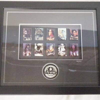 1187	FRAMED LIMITED EDITION NO. 789/1977 STAR WARS 25TH ANNIVERSARY PIN SET W/ COA. 17 1/4 IN X 15 IN. 
