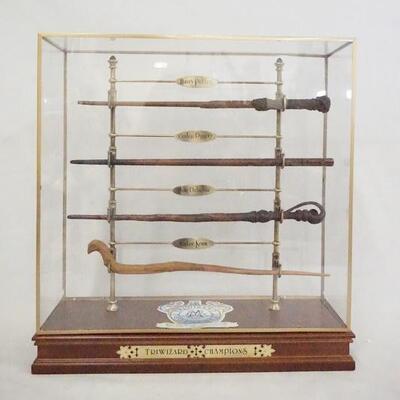 1185	HARRY POTTER THE NOBLE COLLECTION TRIWIZARD CHAMPIONS WAND DISPLAY W/ 4 WAND REPLICAS FOR HARRY POTTER, CEDRIC DIGGORY, FLEUR...