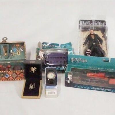 1177	LOT OF MISC. HARRY POTTER COLLECTABLES LOT INCLUDES A NOBLE COLLECTION QUIDDITCH CHEST, NECA TRAIN & CAR/BUS MODEL, FENRIR GREYWOLF...