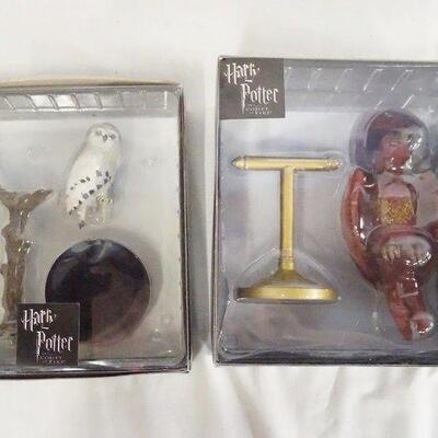 1129	LOT OF TWO HARRY POTTER TONNER FIGURES; HEDWIG & FAWKES. THE PERCH FOR FAWKES FIGURE HAS BEEN REPAIRED. BOTH COME W/ ORIGINAL BOXES 
