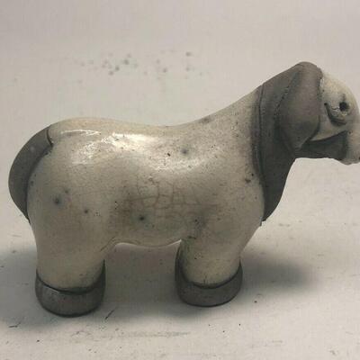https://www.ebay.com/itm/124835396015	ME7026 South African Raku Pottery Lamb Figurine
