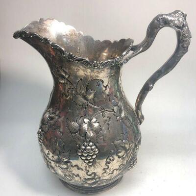 https://www.ebay.com/itm/114902643909	ME7040 Sterling silver T. Hausmann & Sons Grape Vine Pitcher (734.3 g)
