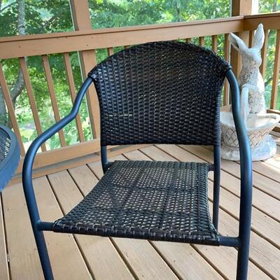 Stackable rattan outdoor chairs set of 4 (1 pictured)
