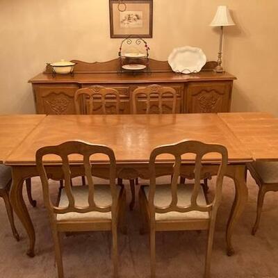 Traditional French Provincial dining table with six chairs. oak. Extends to 95