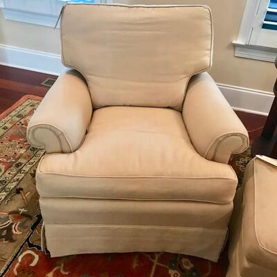 Beige linen upholstered swivel rocker $399
2 available